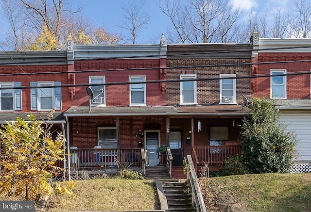 view of property with covered porch