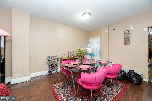 dining room featuring dark hardwood / wood-style flooring