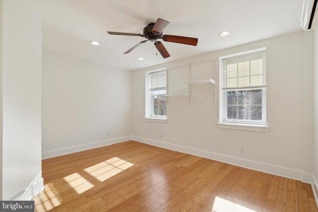 unfurnished room with wood-type flooring and ceiling fan