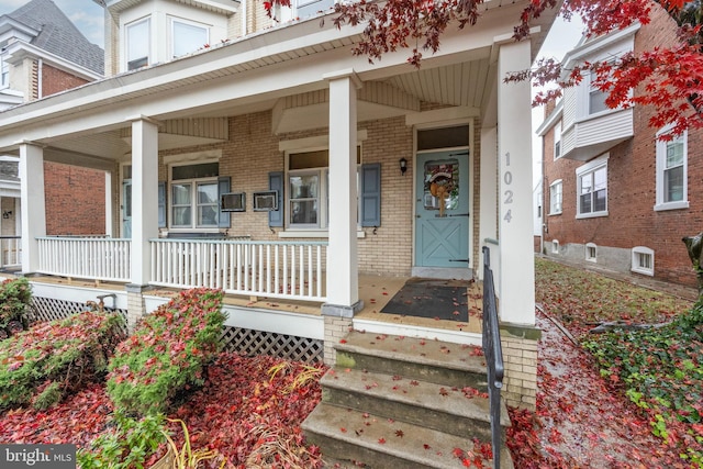 property entrance with a porch