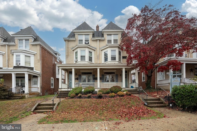 victorian home featuring covered porch