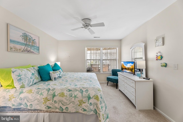 bedroom with light carpet and ceiling fan