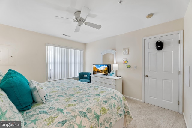 carpeted bedroom featuring ceiling fan