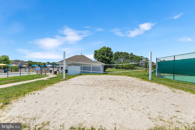 view of property's community featuring volleyball court