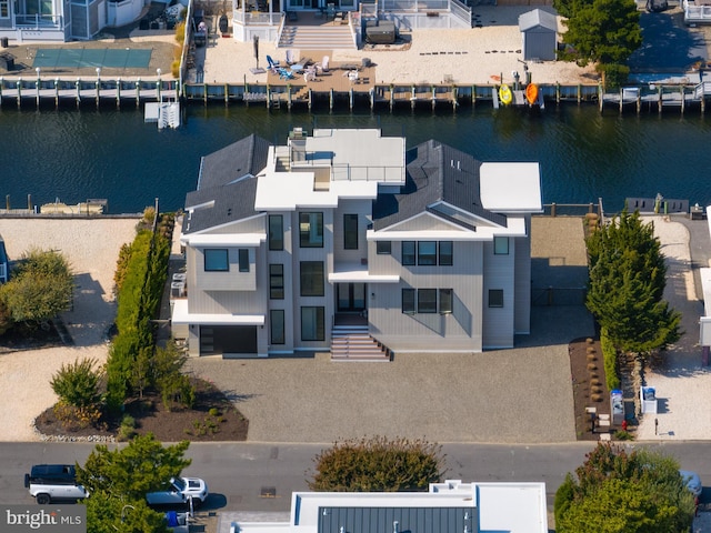 drone / aerial view featuring a water view