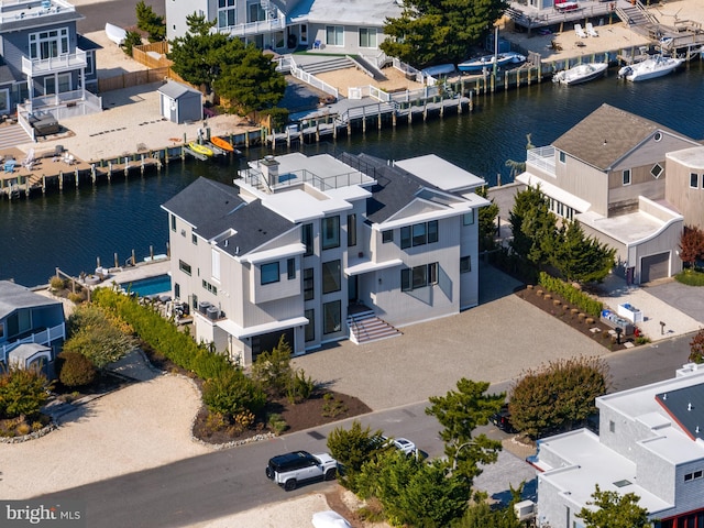 bird's eye view with a water view