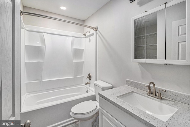 full bathroom featuring shower / bathing tub combination, vanity, and toilet