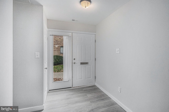 foyer entrance featuring light hardwood / wood-style flooring