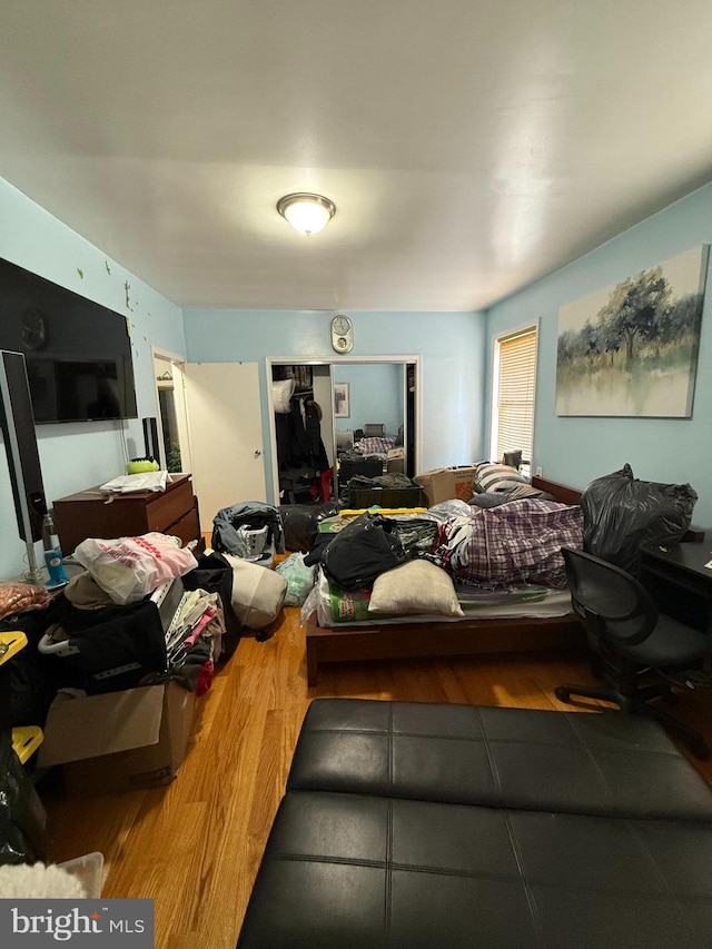 bedroom featuring hardwood / wood-style flooring