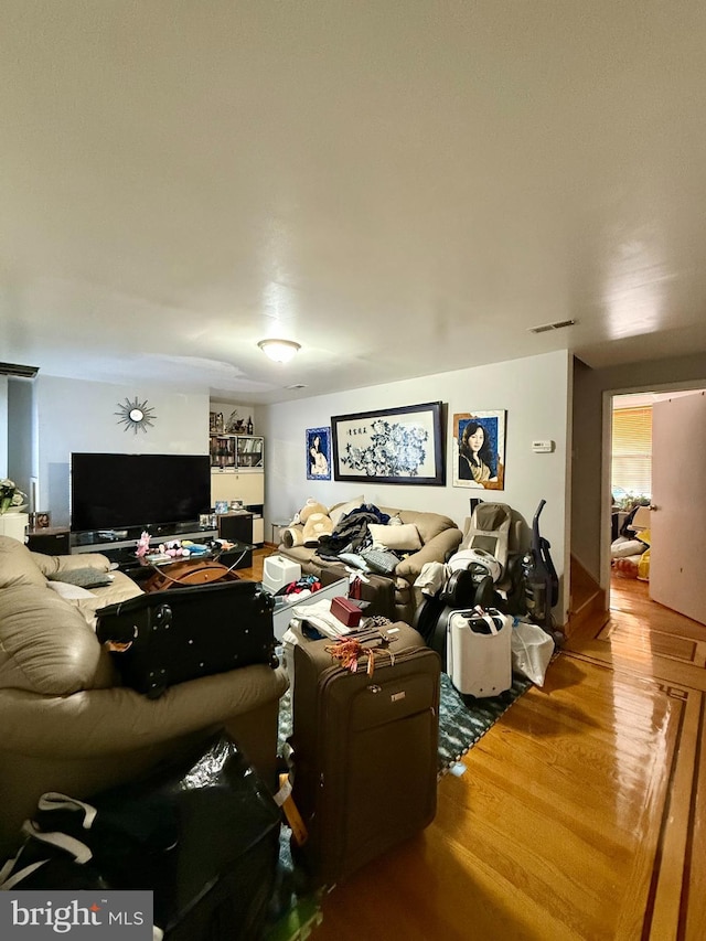 living room with hardwood / wood-style flooring