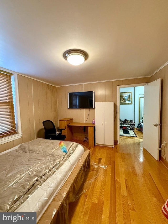 bedroom with light wood-type flooring