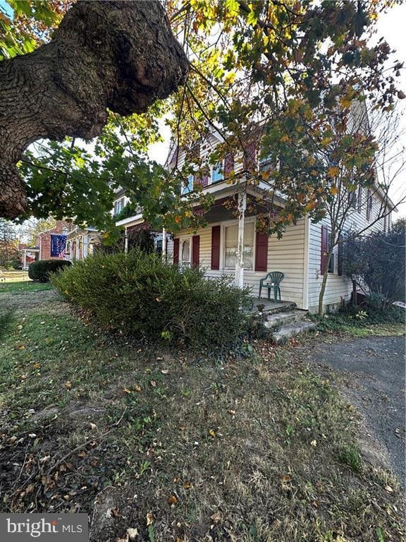 view of home's exterior featuring a yard