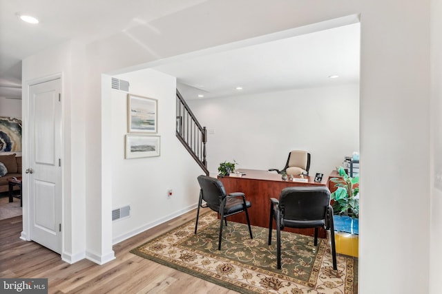 home office featuring light hardwood / wood-style floors