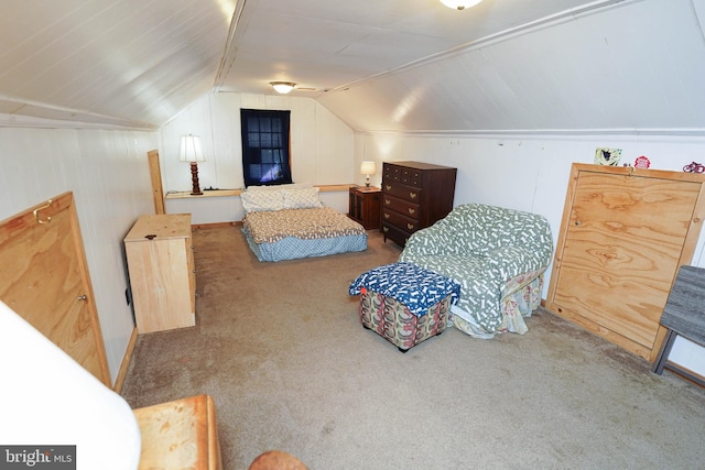 carpeted bedroom with vaulted ceiling