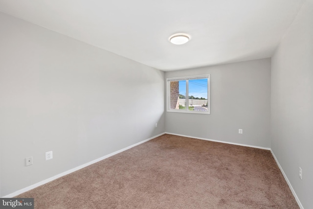 view of carpeted spare room