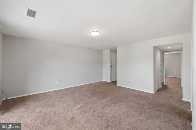 unfurnished room with carpet flooring