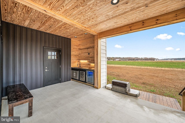 view of patio / terrace featuring a rural view