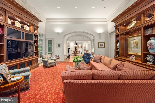 living room with ornamental molding