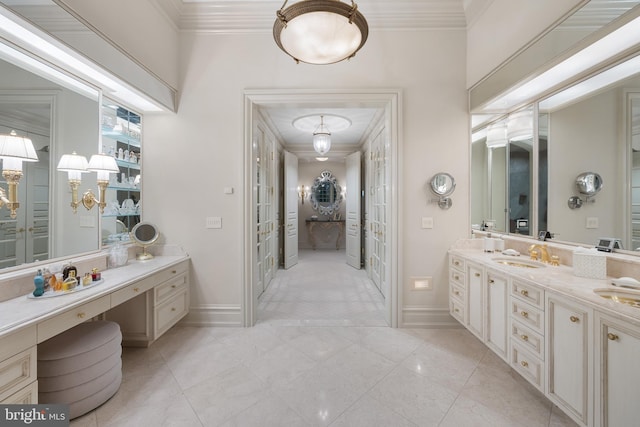 bathroom featuring vanity, tile patterned floors, and crown molding