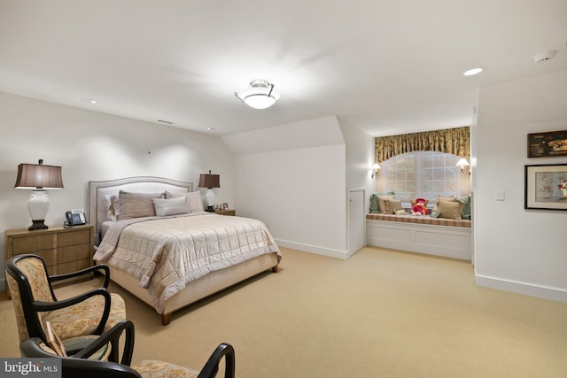 bedroom with light colored carpet