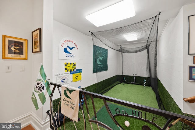 recreation room featuring golf simulator