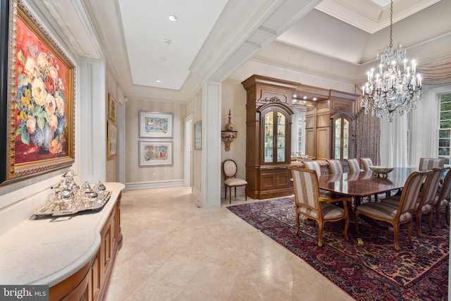 dining room featuring a notable chandelier and crown molding