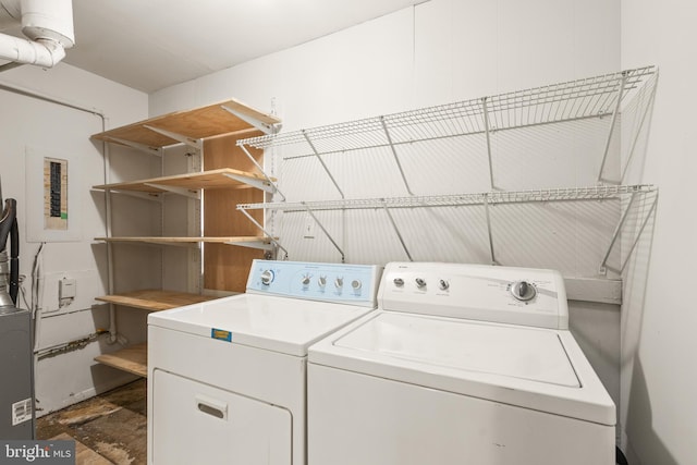 washroom with separate washer and dryer