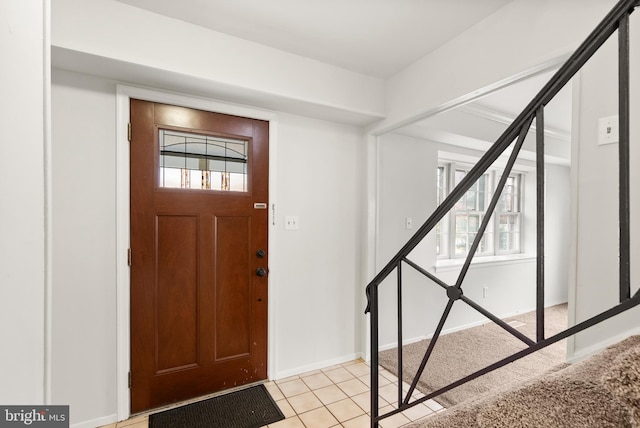 entryway featuring a wealth of natural light and light tile patterned floors