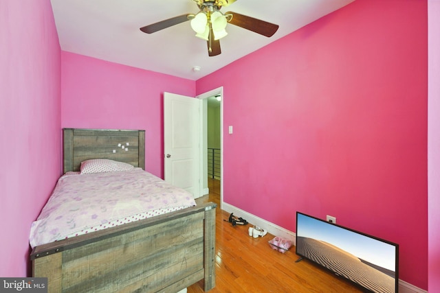 5019 N Franklin St, Philadelphia, PA 19120 - bedroom featuring baseboards, wood finished floors, and ceiling fan