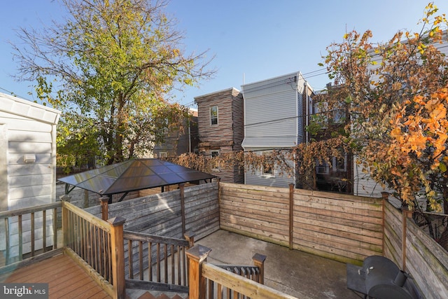 wooden deck with a gazebo