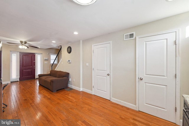 entryway featuring ceiling fan and light wood-type flooring