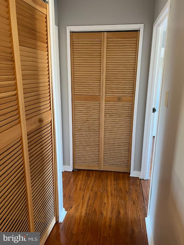 hallway featuring hardwood / wood-style flooring