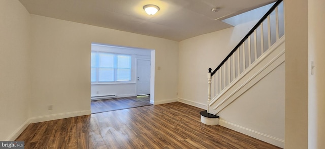 foyer featuring dark wood-type flooring and a baseboard radiator