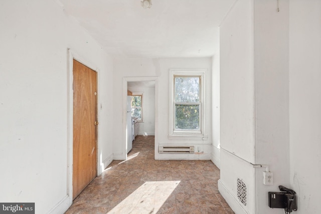 interior space with a baseboard heating unit