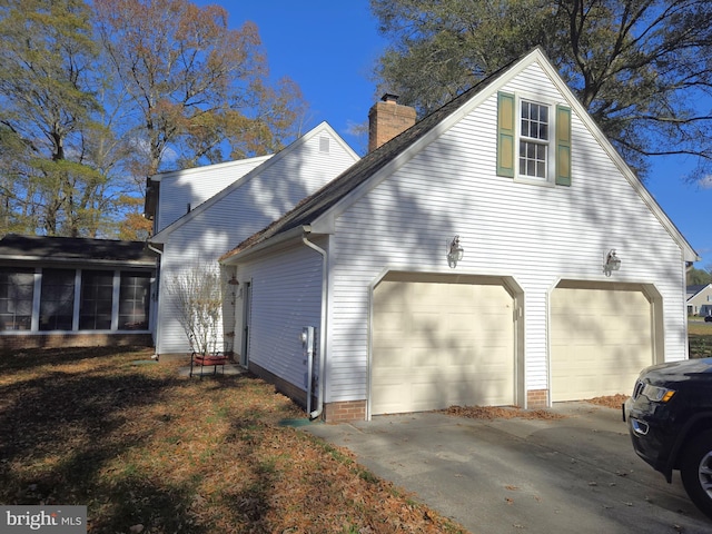 view of property exterior with a garage