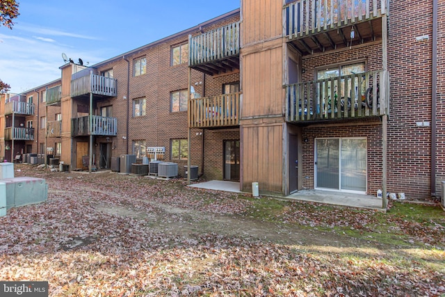 view of property featuring central AC unit