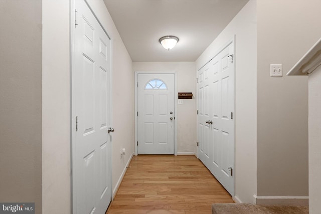 entryway with light wood-type flooring