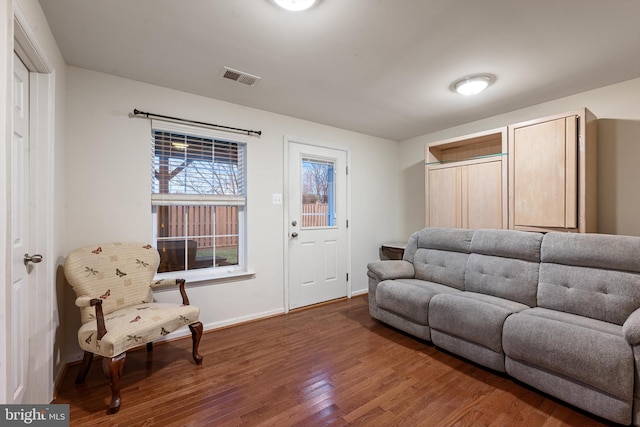 living room with dark wood-type flooring