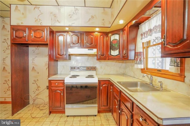 kitchen featuring sink and white electric range