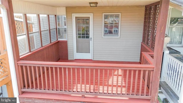 property entrance featuring covered porch