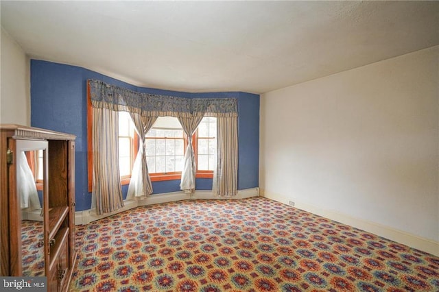 spare room with carpet