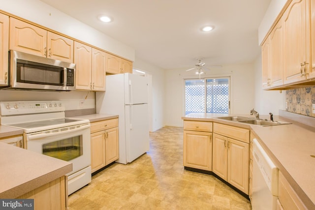 kitchen featuring ceiling fan, sink, white appliances, and light brown cabinets