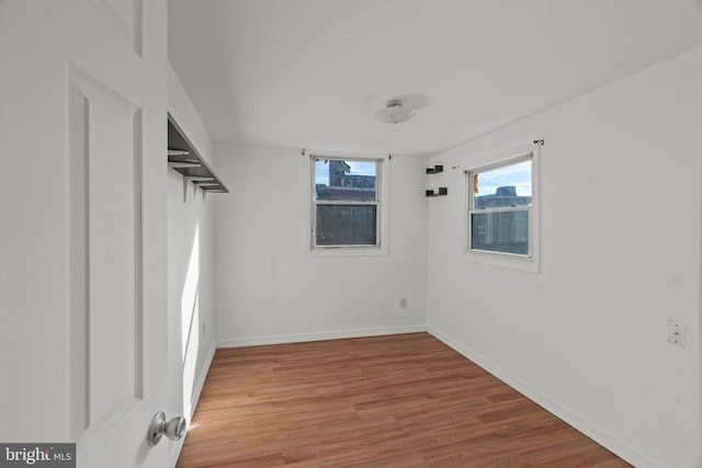 empty room featuring hardwood / wood-style floors