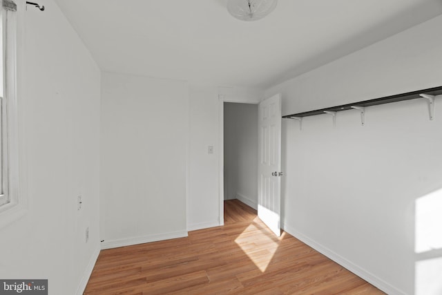 unfurnished bedroom featuring light hardwood / wood-style floors