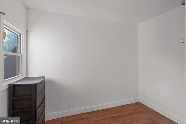 empty room featuring hardwood / wood-style floors