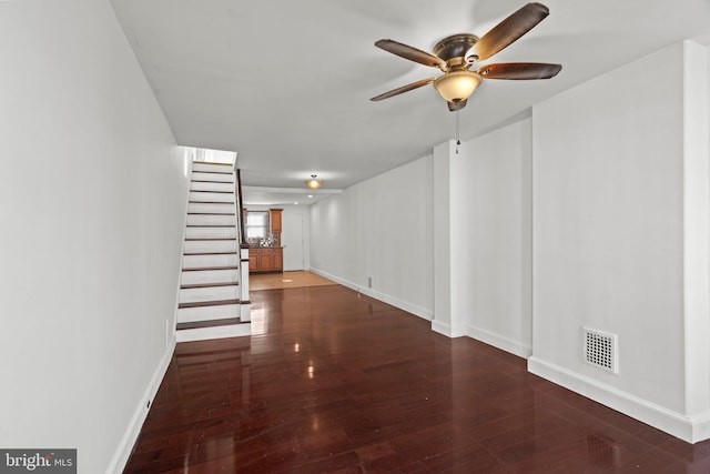 hall featuring dark wood-type flooring