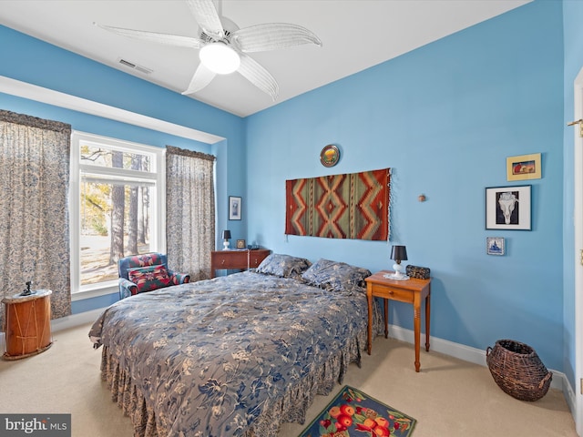 carpeted bedroom featuring ceiling fan