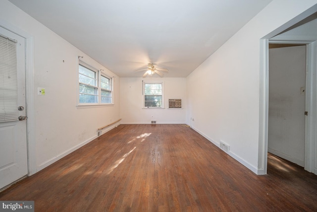 interior space with ceiling fan, dark wood-type flooring, and a baseboard radiator