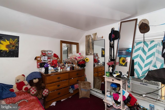 bedroom with lofted ceiling