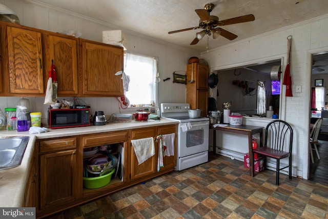 kitchen featuring electric range, ceiling fan, and ornamental molding